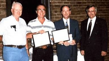 Fred Holderman Accepting Certificates for his son Travis Holderman