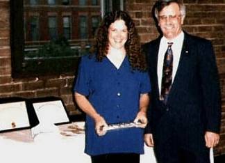 Susan Johnson receiving the Most Outstanding New Apprentice award